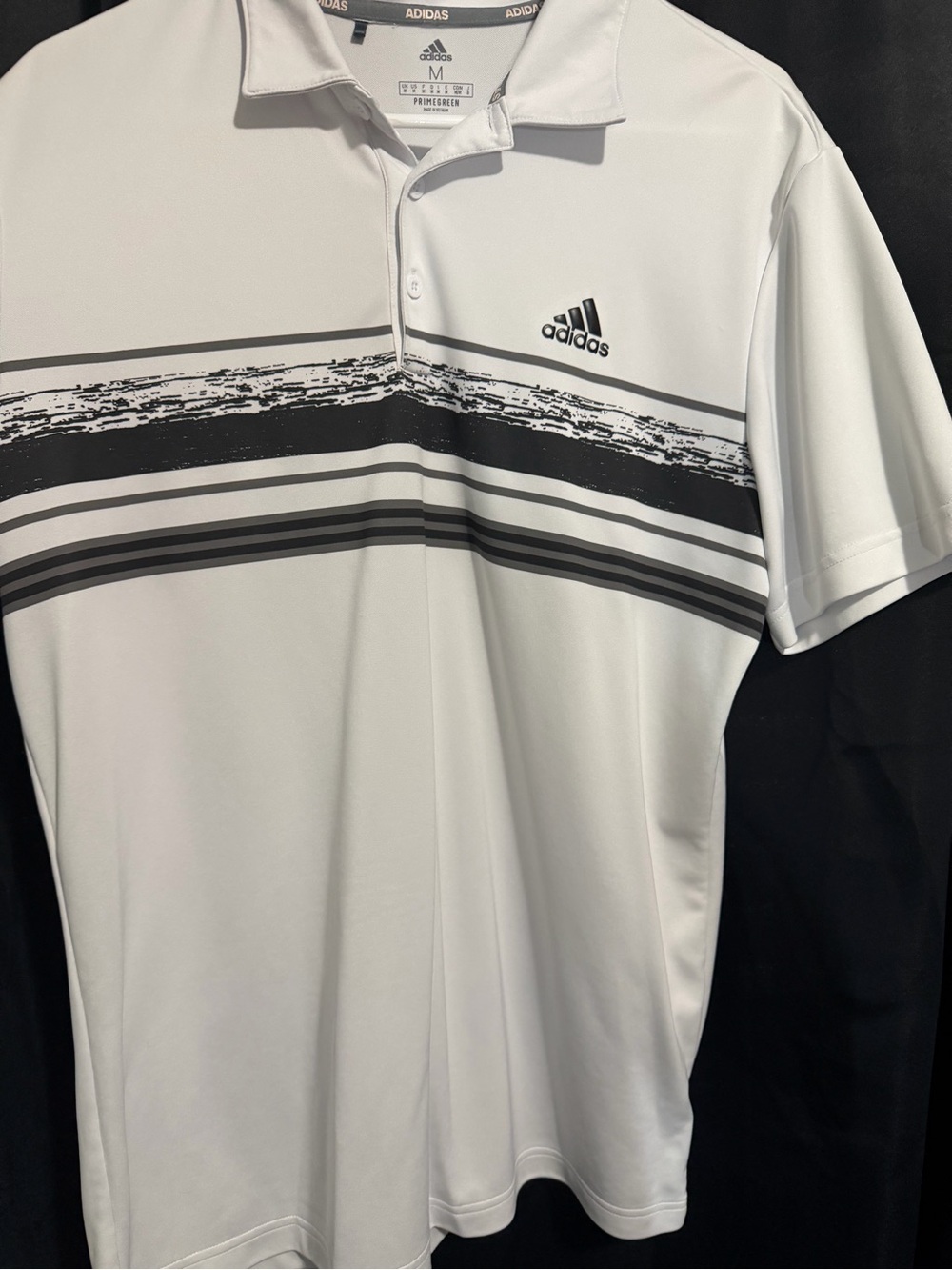 adidas White Polo with Black Striped Chest Design